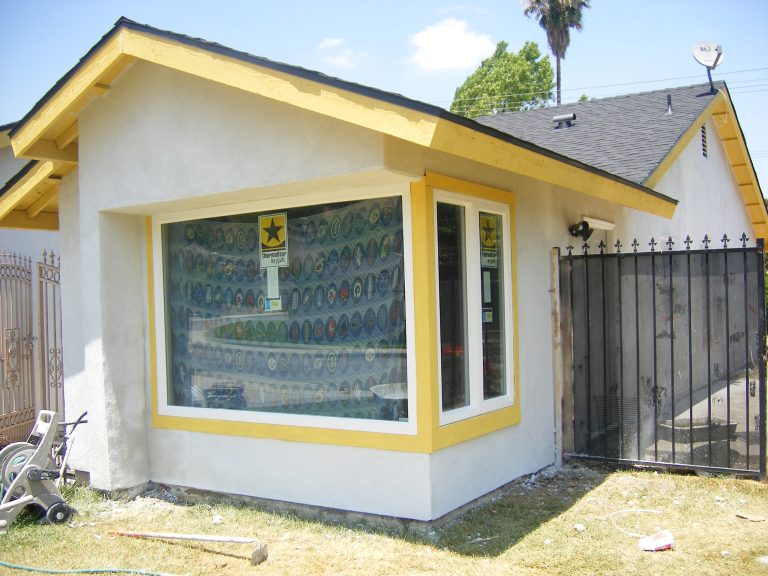 09 Kevin Davis after stucco & repair of front window pic 2
